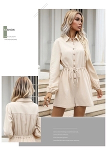 Detail view of apricot long sleeve romper with drawstring waist and button collar