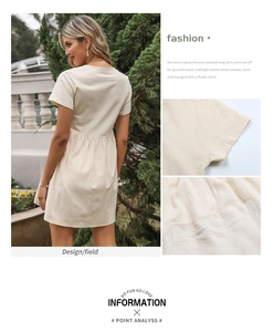 Detail of short sleeves and breathable cotton linen fabric texture on beige summer dress