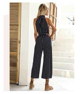 Polka dot wide-leg jumpsuit with halter neck and backless waist detail for summer