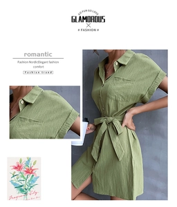 Detail of green cotton linen shirt dress showing wooden buttons and chest pocket