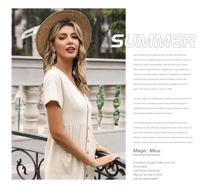 Detail of summer V-neck beige dress featuring button-down front and pleated waist
