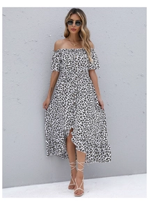 Detail of off-shoulder floral dress with ruffled sleeves and high-low hemline