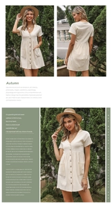 Detail view of beige linen V-neck short sleeve button dress with functional pockets