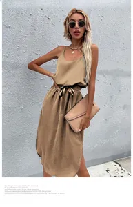Detail of khaki satin midi dress showing waist drawstring and side slit texture