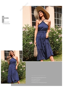 Detailed view of polka dot halter neckline and ruffled bodice on summer vacation dress
