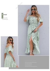 Detail of light green floral dress with off-shoulder neckline and buttons on front