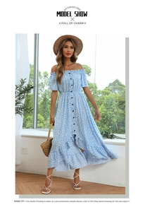 Detail of off-shoulder floral dress with wood-style buttons and light blue pattern