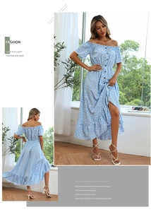 Detail of light blue floral dress with off-shoulder neckline and white daisy pattern