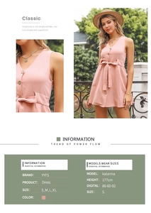 Detail view of pink V-neck sleeveless dress with button front and bow tie waist detail