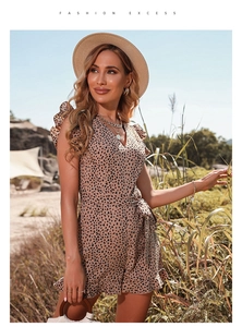 Detail view of summer leopard print romper featuring ruffle sleeves and a waist tie belt