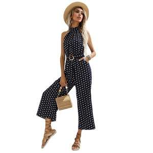 Summer polka dot halter neck wide leg jumpsuit with waist belt and retro style