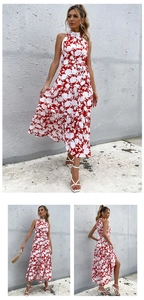 Détails de la robe longue d'été à fleurs rouges, décolleté licou et jupe à volants