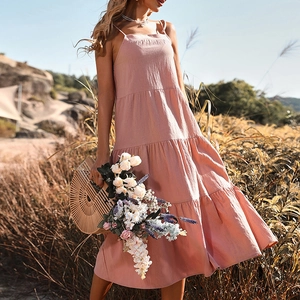 Sleeveless mauve tiered cotton linen midi dress for women in a sunny meadow
