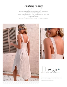 Detail of a beige cotton linen summer dress featuring wide straps and open back design