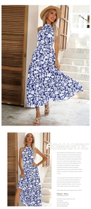 Détail de la robe maxi d'été dos nu avec imprimé floral bleu et taille marquée