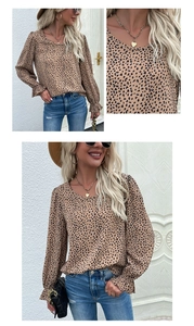 Close-up detail of leopard print long sleeve shirt with ruffled cuffs and crew neck