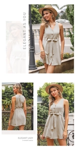 Detail view of V-neck sleeveless linen dress with wooden buttons and waist tie
