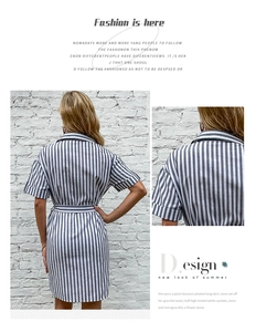 Detail view of blue vertical stripes and lapel collar on a summer shirt dress