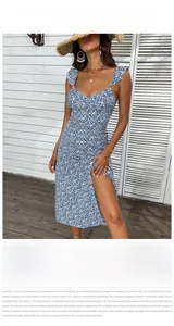 Detailed close-up of blue floral maxi dress with ruffle straps and side split
