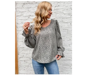 Detail showing ruffle lantern sleeves and leopard floral print on women's long sleeve shirt