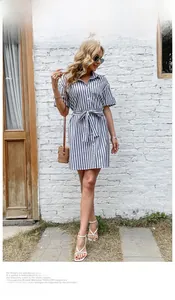 Detail of blue and white striped shirt dress with waist tie and turnover collar