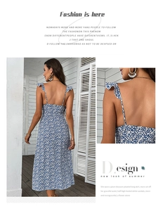 Detail of floral backless dress showing ruffled straps and delicate plum blossom print