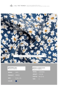 Detailed close-up of dark blue floral fabric with white daisies for summer maxi dress