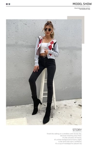 Modern urban style argyle v-neck knit cardigan styled with white crop top and jeans