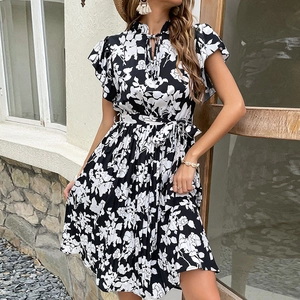 Women's summer floral dress with ruffle sleeves and waist tie in black and white pattern