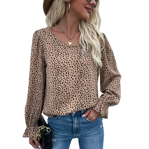 Women's leopard print long sleeve top with crew neck and ruffled cuffs on white background
