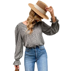 Women's light grey crew neck long sleeve shirt with black speckled print and lantern sleeves