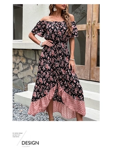 Detail of the ruffle hem on an off-the-shoulder floral dress with pink patterned lining