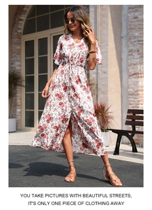 Close-up of floral V-neck midi dress featuring drawstring waist and front split detail