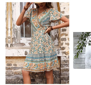 Detail of bohemian printed V-neck dress featuring floral patterns and ruffled short sleeves