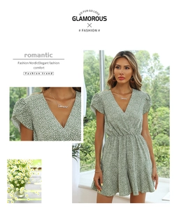 Detail of V-neck and ruffled sleeves on green floral summer jumpsuit for women