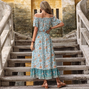 Floral off-shoulder maxi dress in light blue with bohemian prints and smocked waist