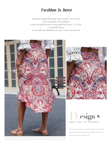 Detail of bohemian paisley print skirt with asymmetric ruffled hem and lightweight fabric