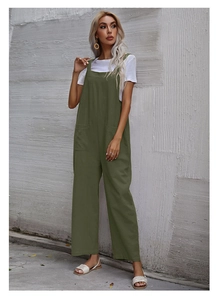 Detail view of military green wide-leg overalls with functional front pockets