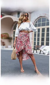 Detail of red paisley wrap skirt featuring ruffles and a stylish side tie closure