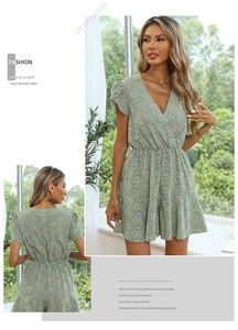 Detailed view of the V-neck and elastic waist on this green floral summer jumpsuit