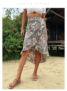 Detail of bohemian paisley print wrap skirt with asymmetric ruffled hem for summer