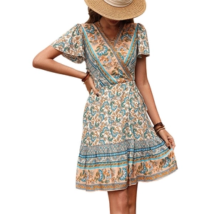 Bohemian floral V-neck wrap dress with ruffle sleeves and vintage print in beige and blue