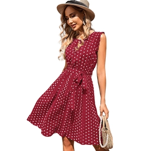 Burgundy polka dot pleated midi dress with sleeveless ruffle neck and waist tie