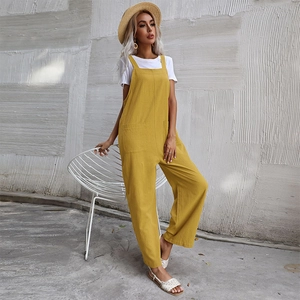 Chic mustard yellow sleeveless jumpsuit with wide legs and functional side pockets for women