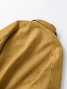 Detail of the stitching on shoulder and collar of this mustard yellow suede jacket