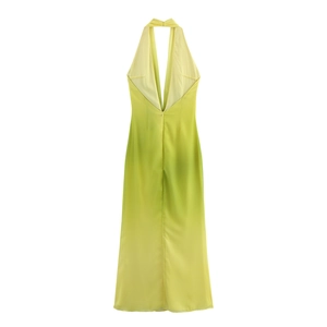 Detail of gradient yellow to lime green halter neck dress with deep V-neckline and open back
