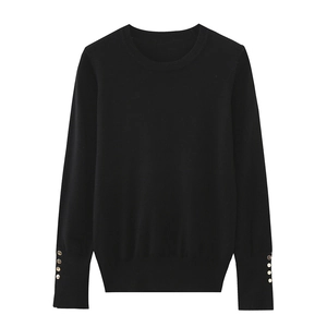 Classic black crewneck knit sweater with decorative gold buttons on the sleeves