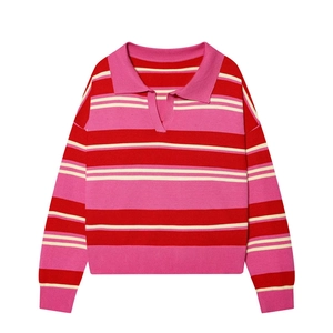 Detail of red and pink striped knit polo shirt with V-neck and ribbed cuffs design