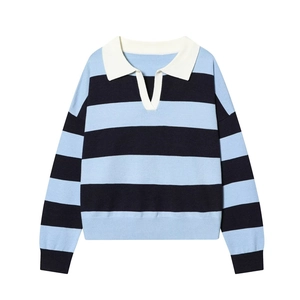 Detail of blue striped knit polo shirt showing white collar and ribbed texture
