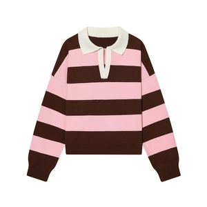 Detail of pink and brown striped knit sweater with white polo collar and ribbed cuffs